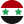 Drapeau tricolore vert, blanc et noir avec deux étoiles rouges centrées.